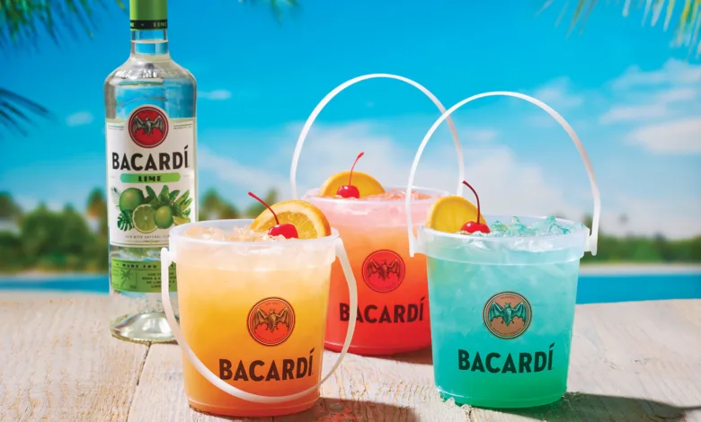 March 20, 2024 - Escape to paradise this spring and embrace the island flair of Applebee’s NEW $10 Bacardi Rum Buckets! Available in three tasty tropical flavors, Applebee’s Bacardi Rum Buckets feature premium spirits with Bacardi Superior and Bacardi Lime for only $10 served in an actual bucket!* Kick back “island style” with Applebee’s three NEW Bacardi Rum Buckets including: NEW Rum Breeze Bucket, a delicious cocktail made with Bacardi Superior Rum, Malibu Coconut Rum, blue curacao, lemon, pineapple juice and lemon lime soda. NEW Tropical Mama Bucket, a zesty twist on a Bahama Mama made with Bacardi Lime Rum, crème de banana liqueur, grenadine, pineapple and orange juice topped with lemon lime soda. NEW Party on the Beach Bucket, a tasty treat featuring Bacardi Lime Rum, peach schnapps, passion fruit, pineapple and orange juice. For traditional deal seekers, toast to spring with Applebee’s NEW Spring Break Sips! Say “adios” to winter blues with the NEW $5 ADIOS, a blue Long Island Iced Tea made with Smirnoff Vodka, Bacardi Superior Rum, Tanqueray Gin, blue curacao, and premium lemon sour topped with lemon lime soda, served in Applebee’s signature Mucho glass. Plus, guests looking for a “buzz-free" beach experience can enjoy the NEW non-alcoholic $4 Mocktail on the Beach, featuring Ocean Spray® Cranberry, orange juice, and peach and Starry® lemon lime soda. Source: Business Wire Applebee's launches NEW Bacardi Rum Buckets in three tropical flavors full of island flair. (Photo: Business Wire)