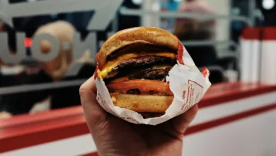 person holding hamburger